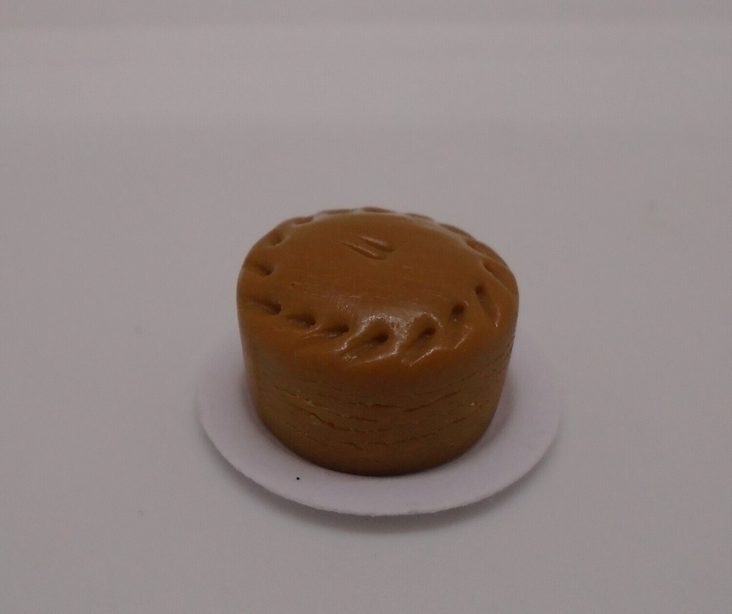LARGE PORK PIE ON PLATE