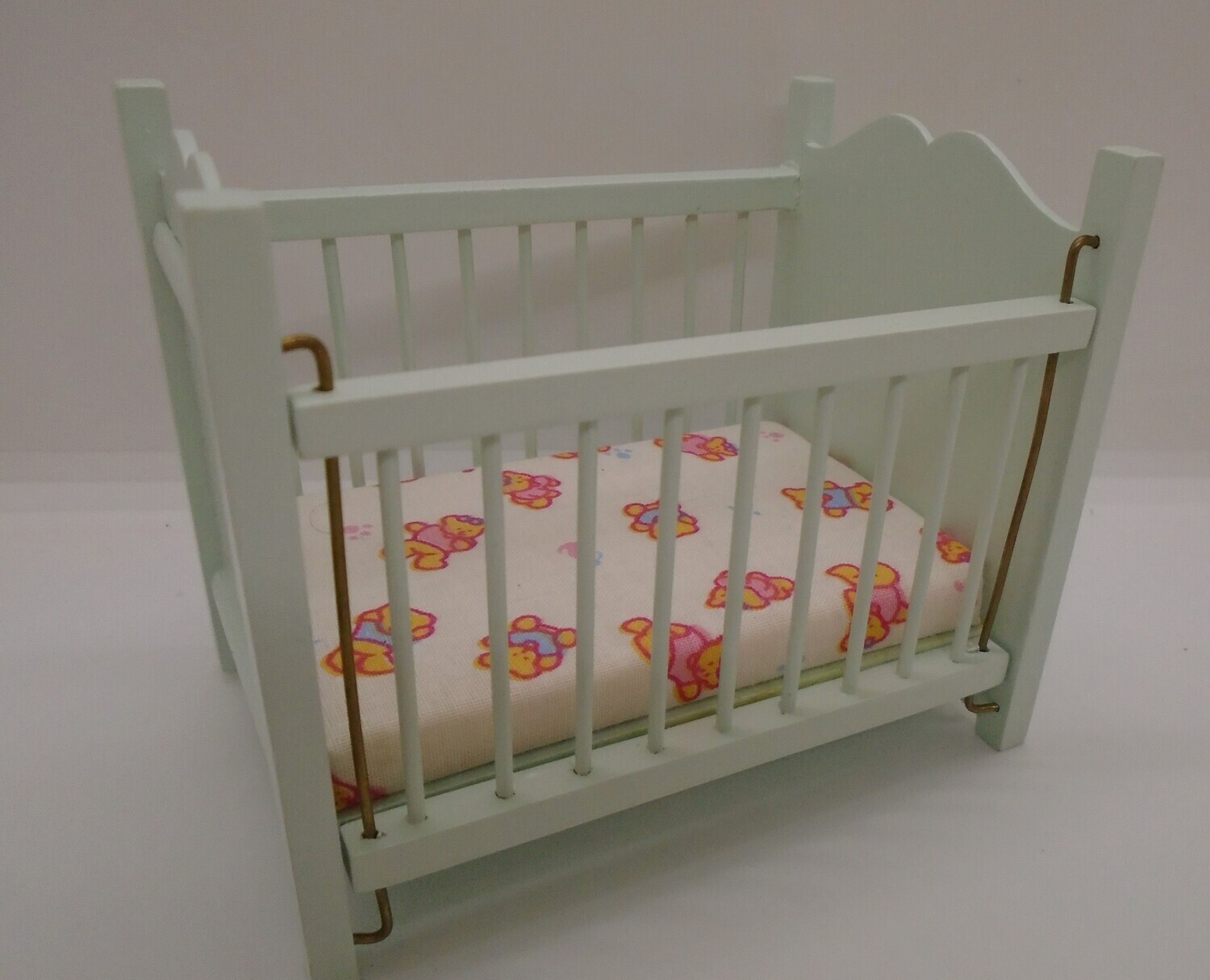 LIGHT MINT GREEN COT WITH DROP DOWN SIDE