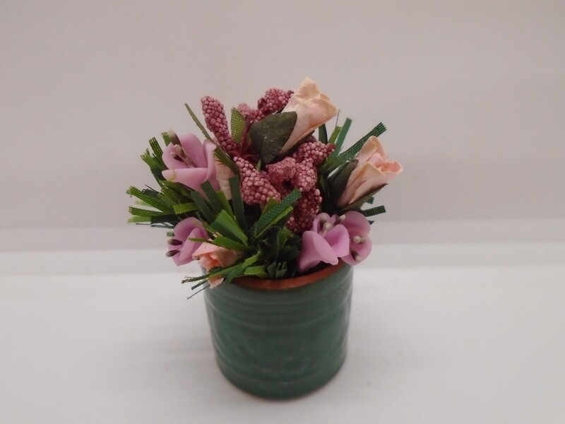 GREEN PLANTER POT WITH FLOWER DISPLAY