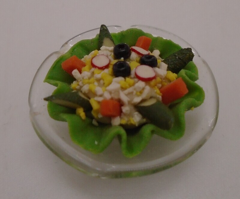 OLIVE SALAD ON GLASS PLATE