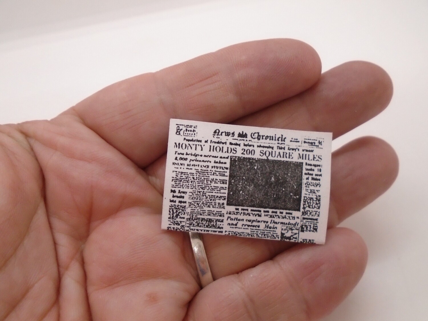 FOLDED NEWSPAPER (CHRONICLE)