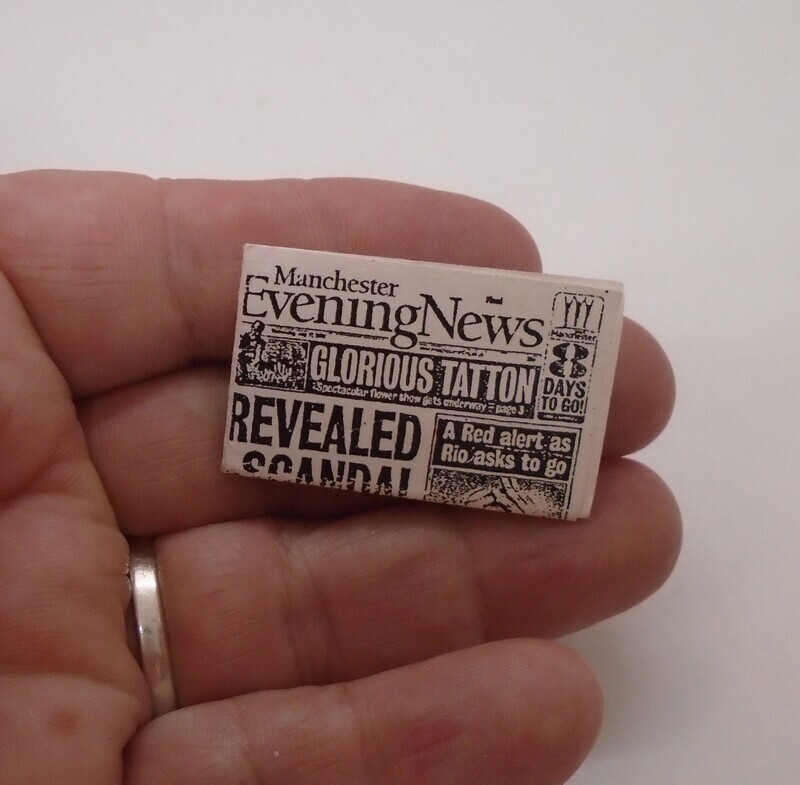 FOLDED EVENING NEWS NEWSPAPER