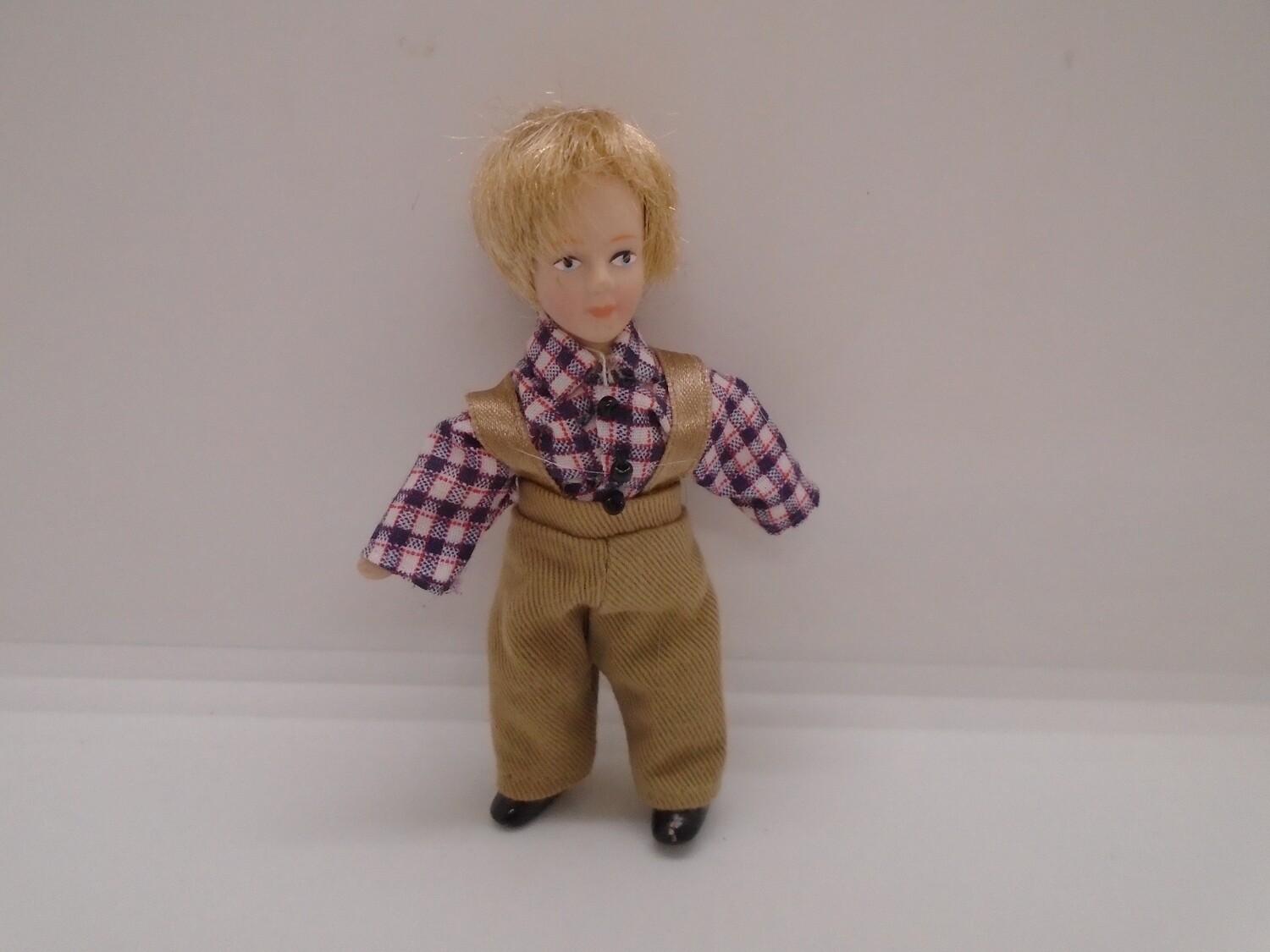 BOY IN CHECK SHIRT