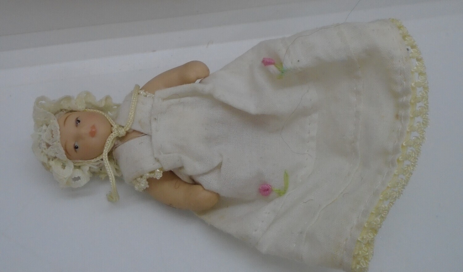BABY IN CHRISTENING GOWN