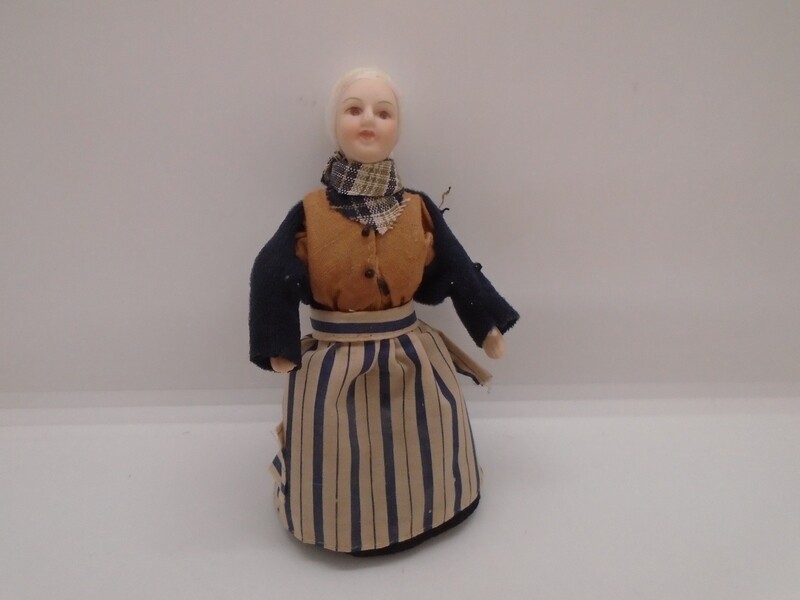 OLD LADY WITH SCARF AND APRON
