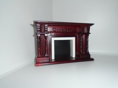 Mahogany coloured wooden fire place