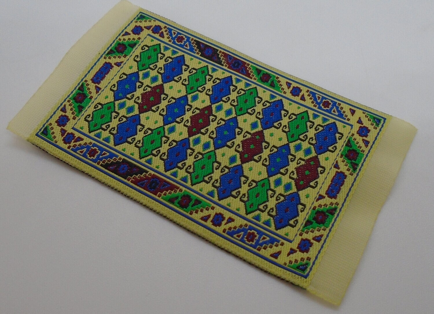 SMALL RED/CREAM/BLUE/CREAM RUG