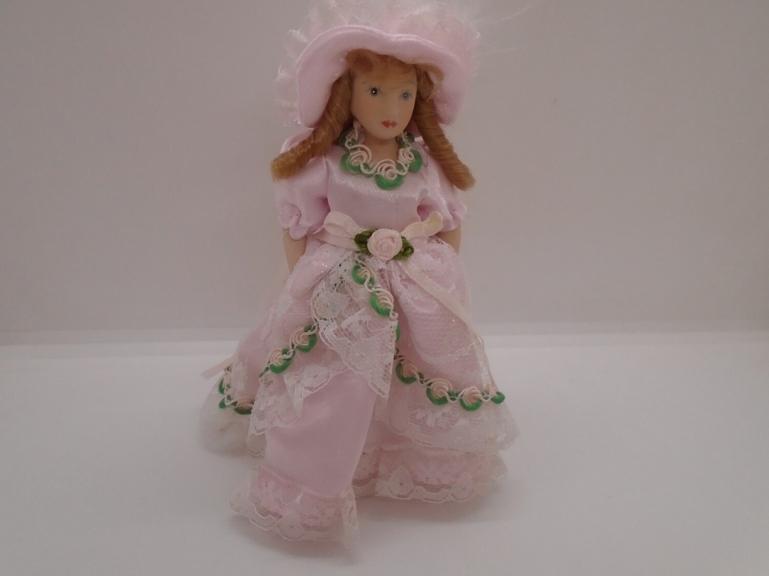 LADY IN PINK WITH HAT