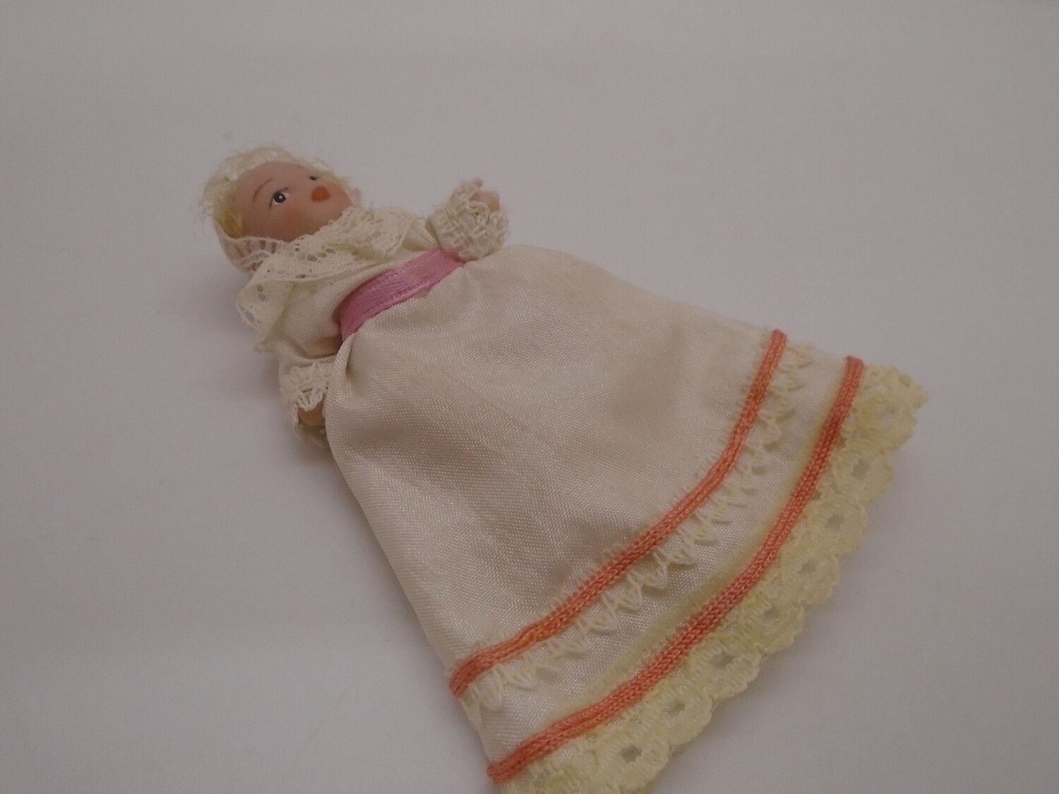 BABY IN CHRISTENING GOWN
