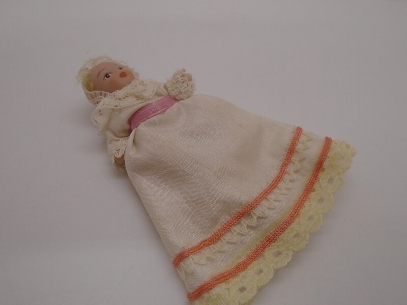 BABY IN CHRISTENING GOWN