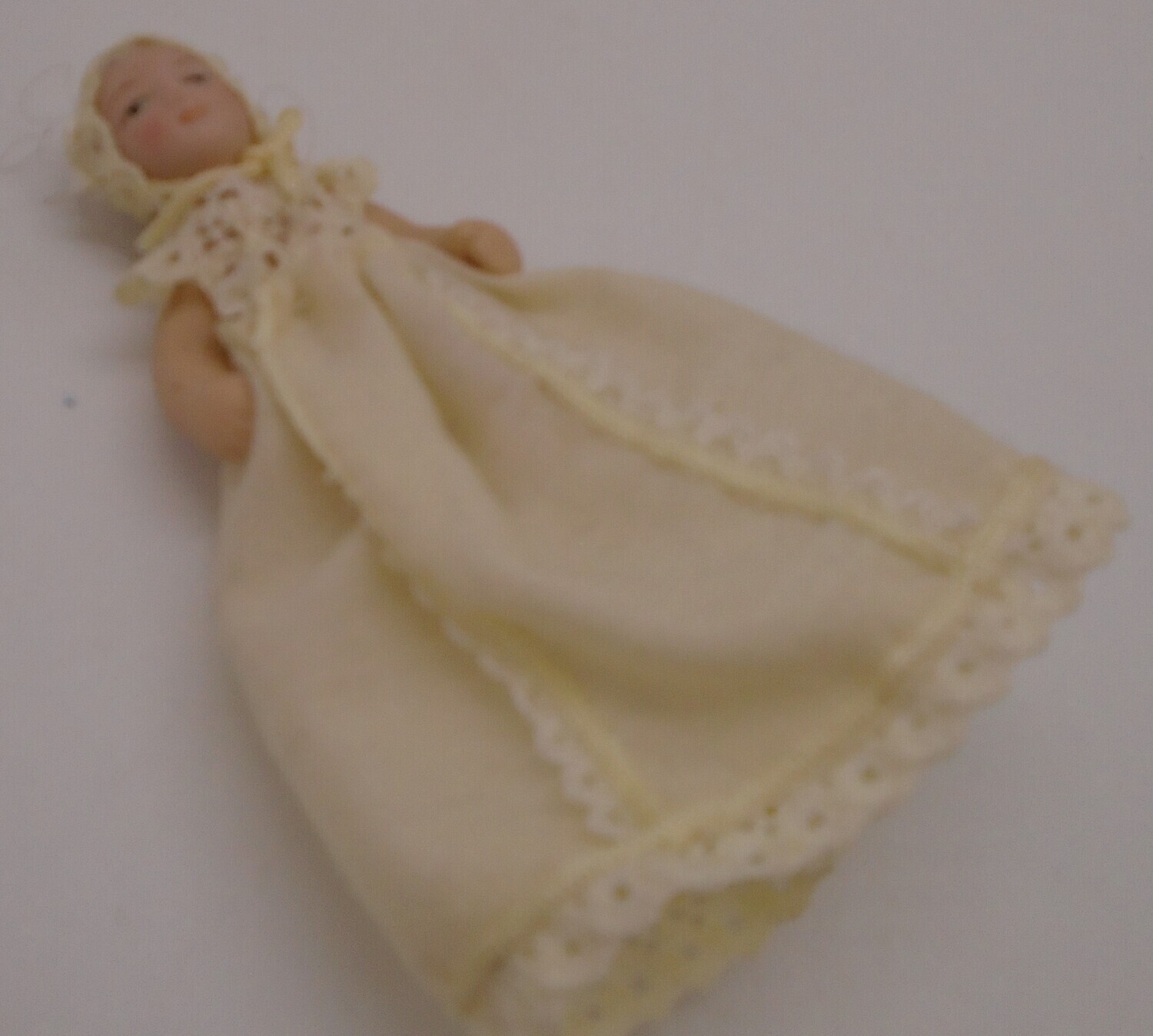 BABY IN CHRISTENING GOWN