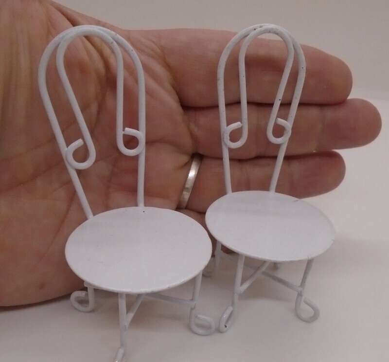PAIR OF WHITE METAL CHAIRS