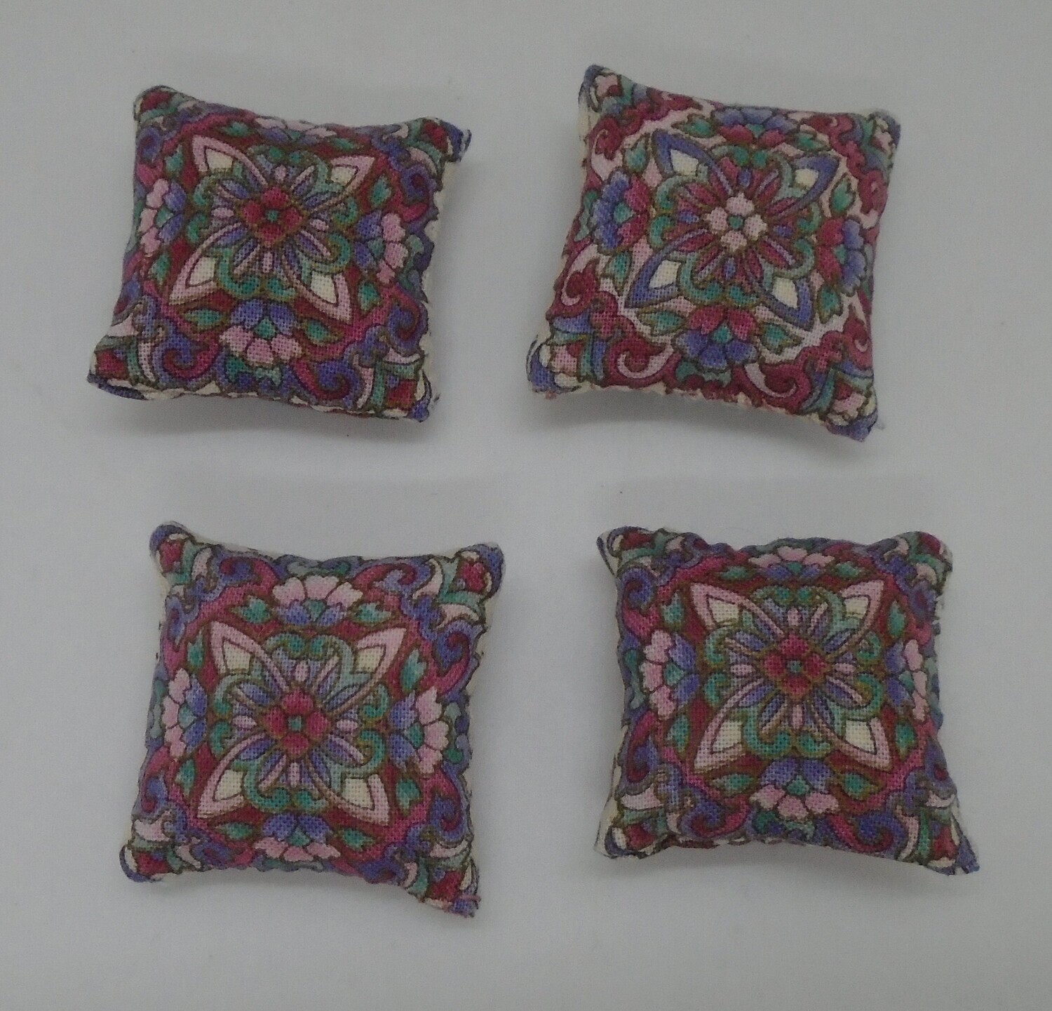 4 PRETTY  HAND CRAFTED CUSHIONS