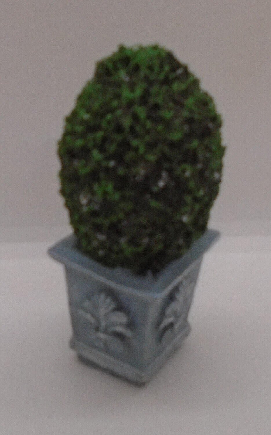 TOPIARY BUSH IN PLANTER