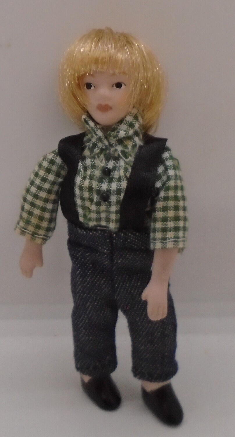 BLONDE BOY IN CHECK SHIRT AND BRACERS