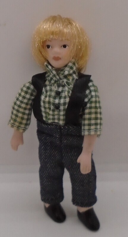 BLONDE BOY IN CHECK SHIRT AND BRACERS
