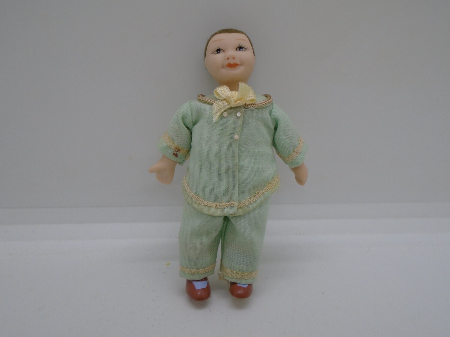 BOY IN MINT OUTFIT
