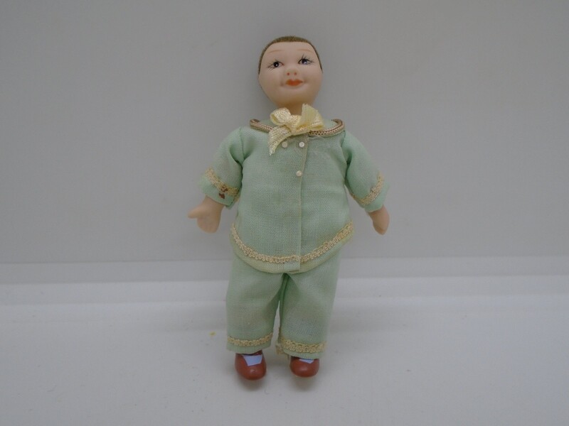 BOY IN MINT OUTFIT