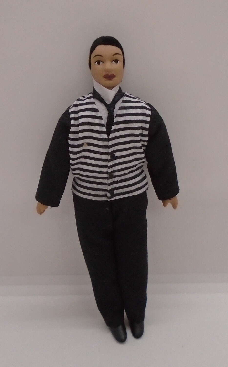 MAN IN BUTLER OUTFIT/BLACK STRIPED SUIT