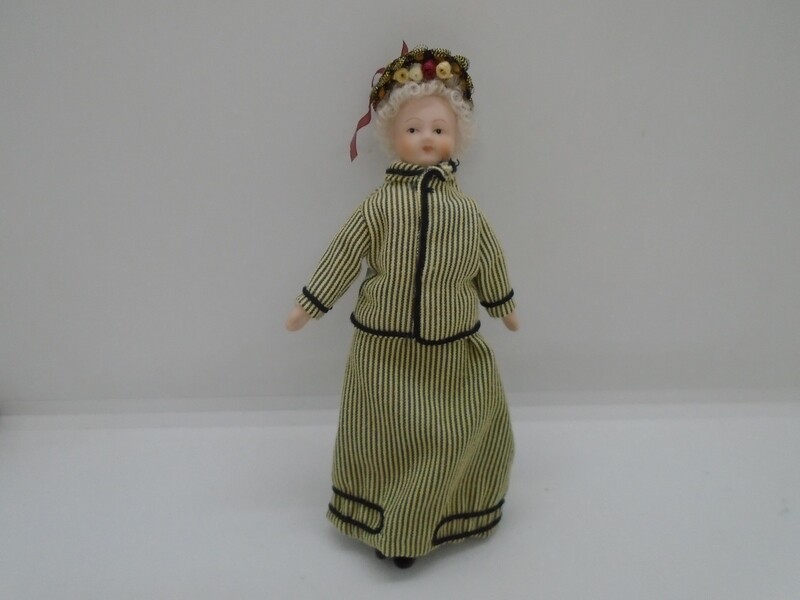 LADY IN GOLD AND BLACK STRIPE