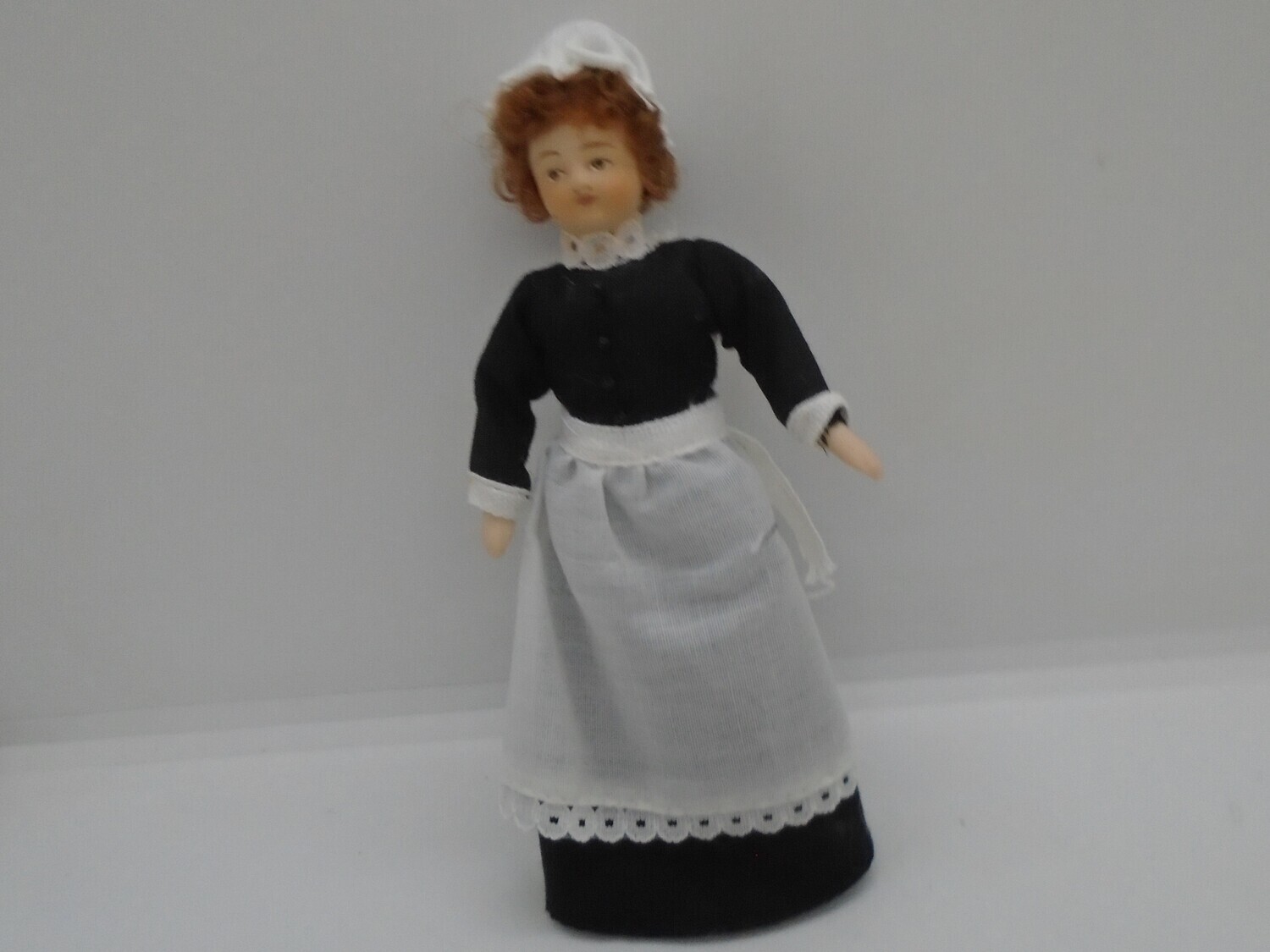 MAID IN BLACK AND WHITE