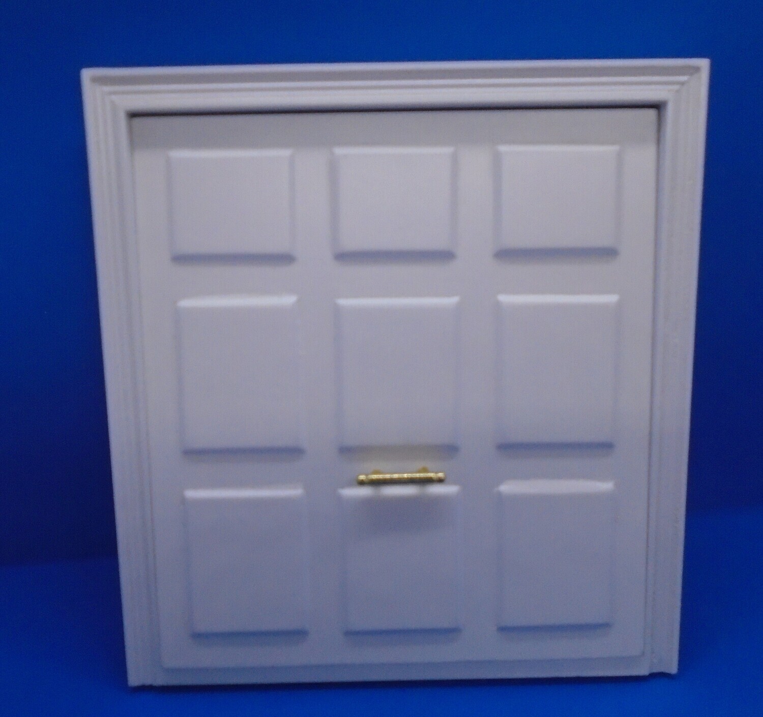 UP AND OVER PAINTED GARAGE DOOR WITH HANDLE
