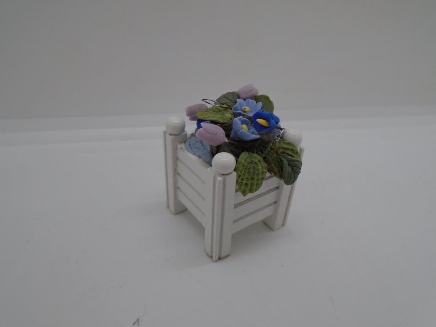 WHITE WOOD SQUARE PLANTER WITH BLUE FLOWERS