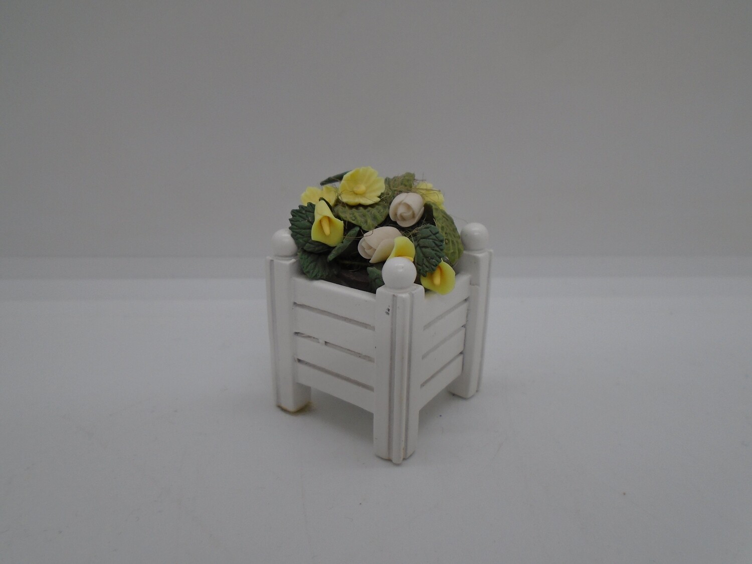 WHITE WOOD SQUARE PLANTER YELLOW FLOWERS