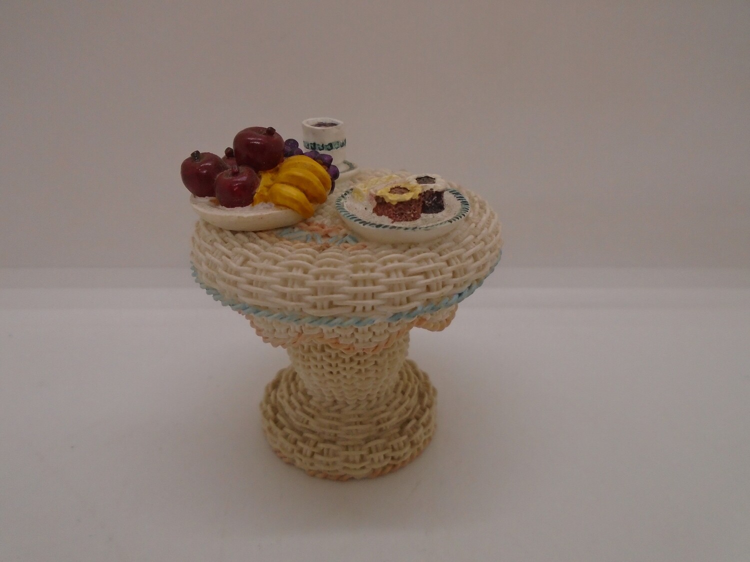 PAINTED WICKER STYLE TABLE WITH SNACKS