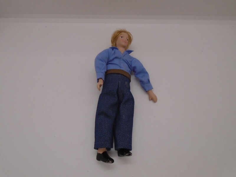 MAN IN BLUE SHIRT AND JEANS