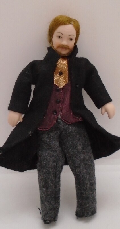 MAN WITH MAROON WAIST COAT