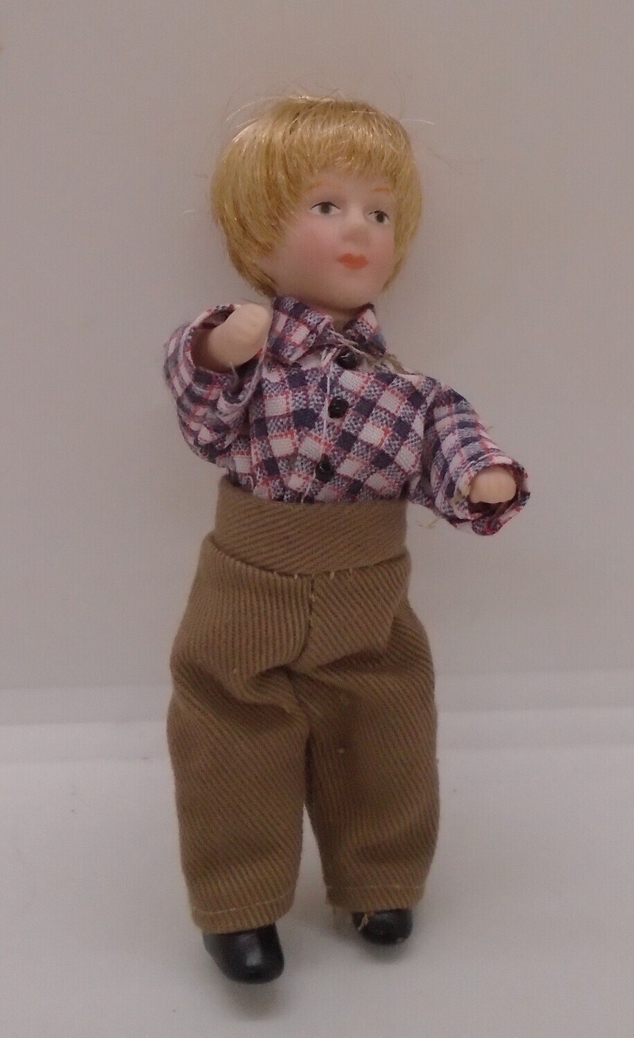 BOY IN CHECK SHIRT