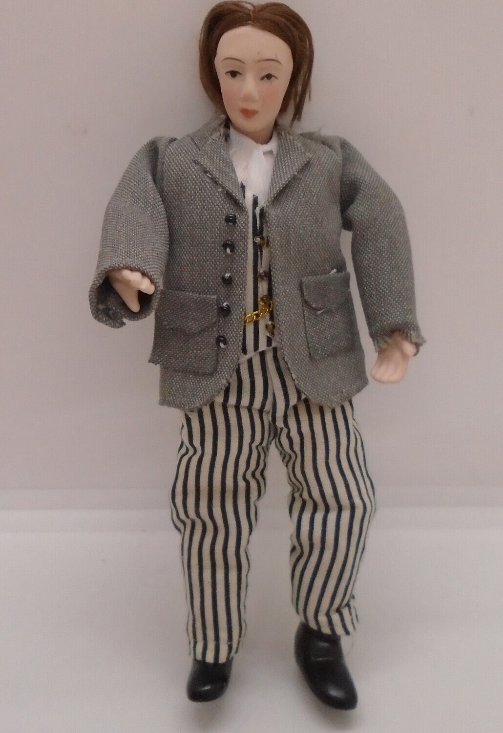 MAN IN STRIPE TROUSERS