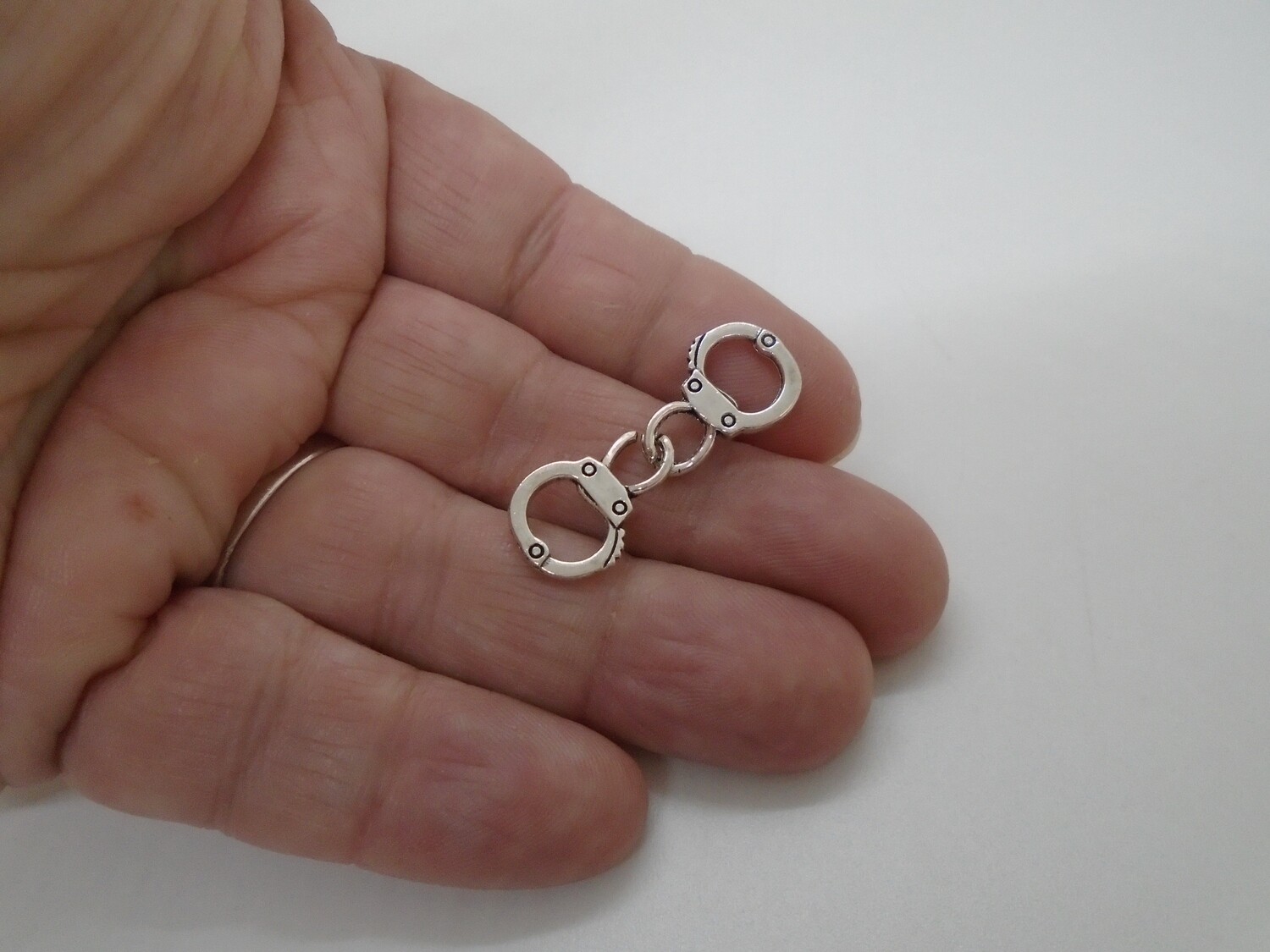 SET OF HANDCUFFS
