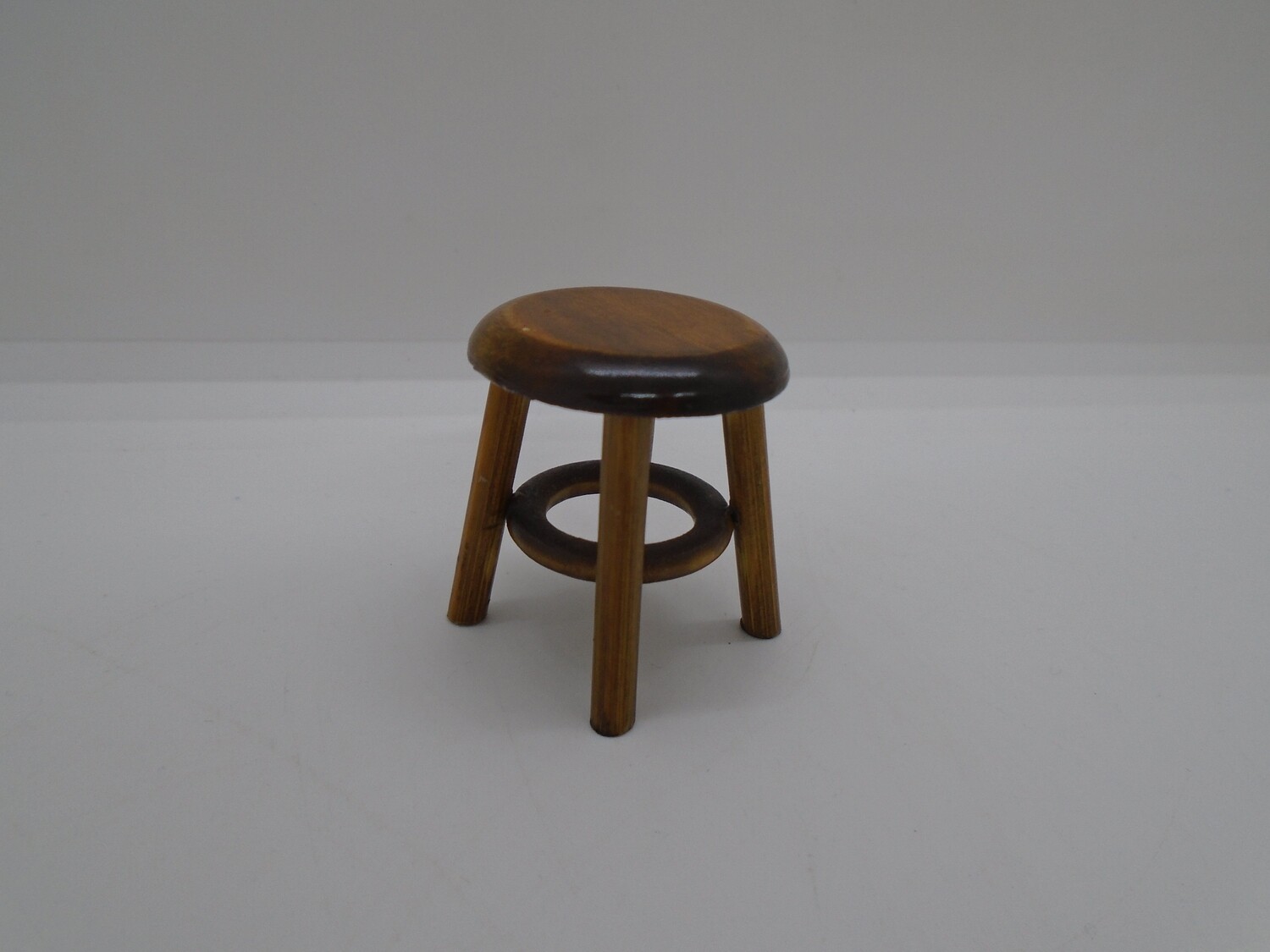 BROWN WOODEN STOOL