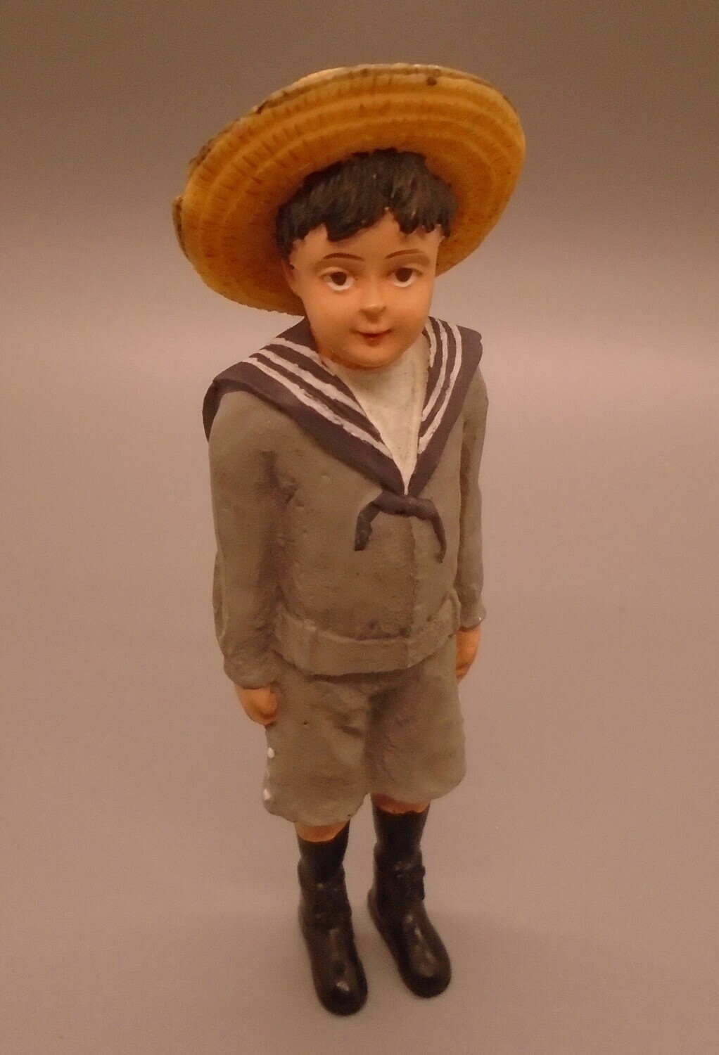BOY IN GREY SAILOR SUIT