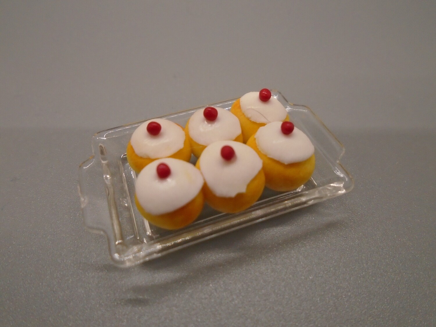 TRAY OF ICED BUNS