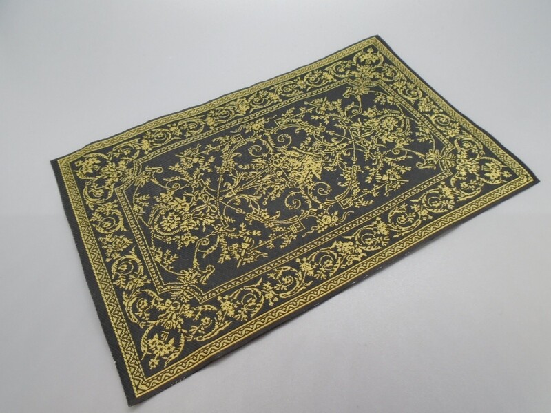 ORNATE BLACK AND GOLD RUG