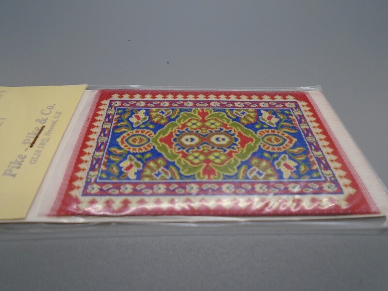 SMALL RED AND BLUE RUG