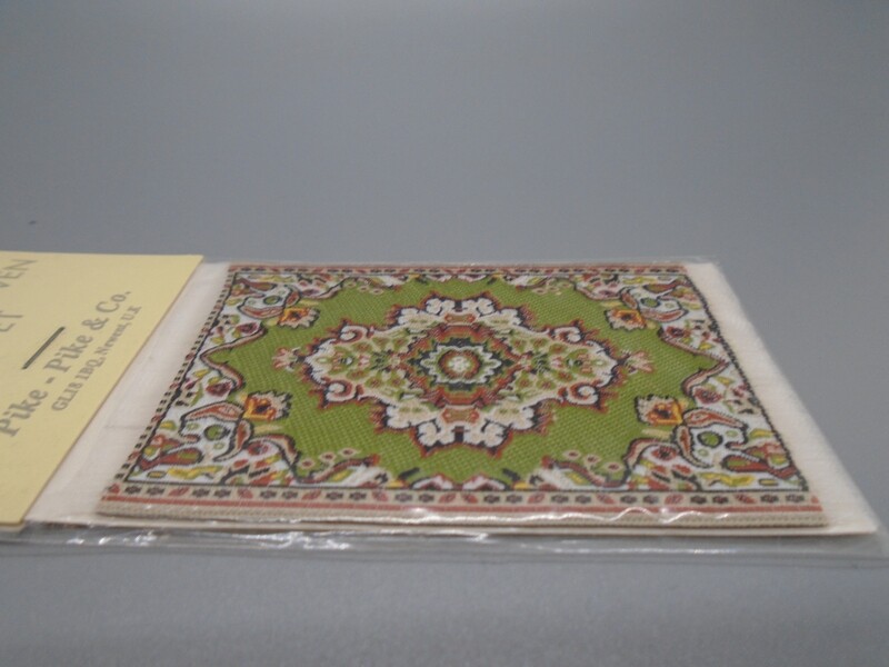 SMALL ORNATE GREEN RUG