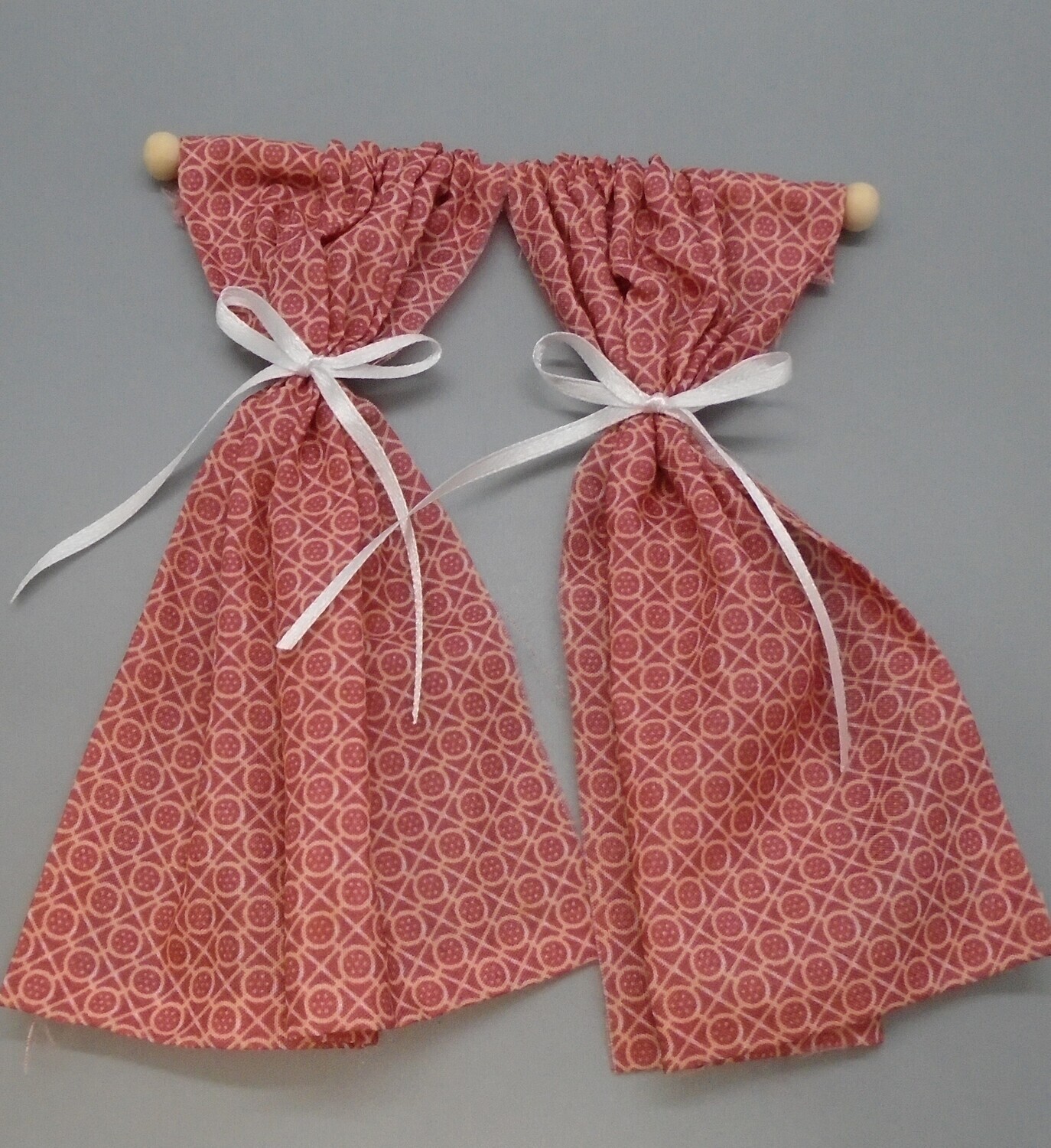 PAIR OF CURTAINS ON A POLE