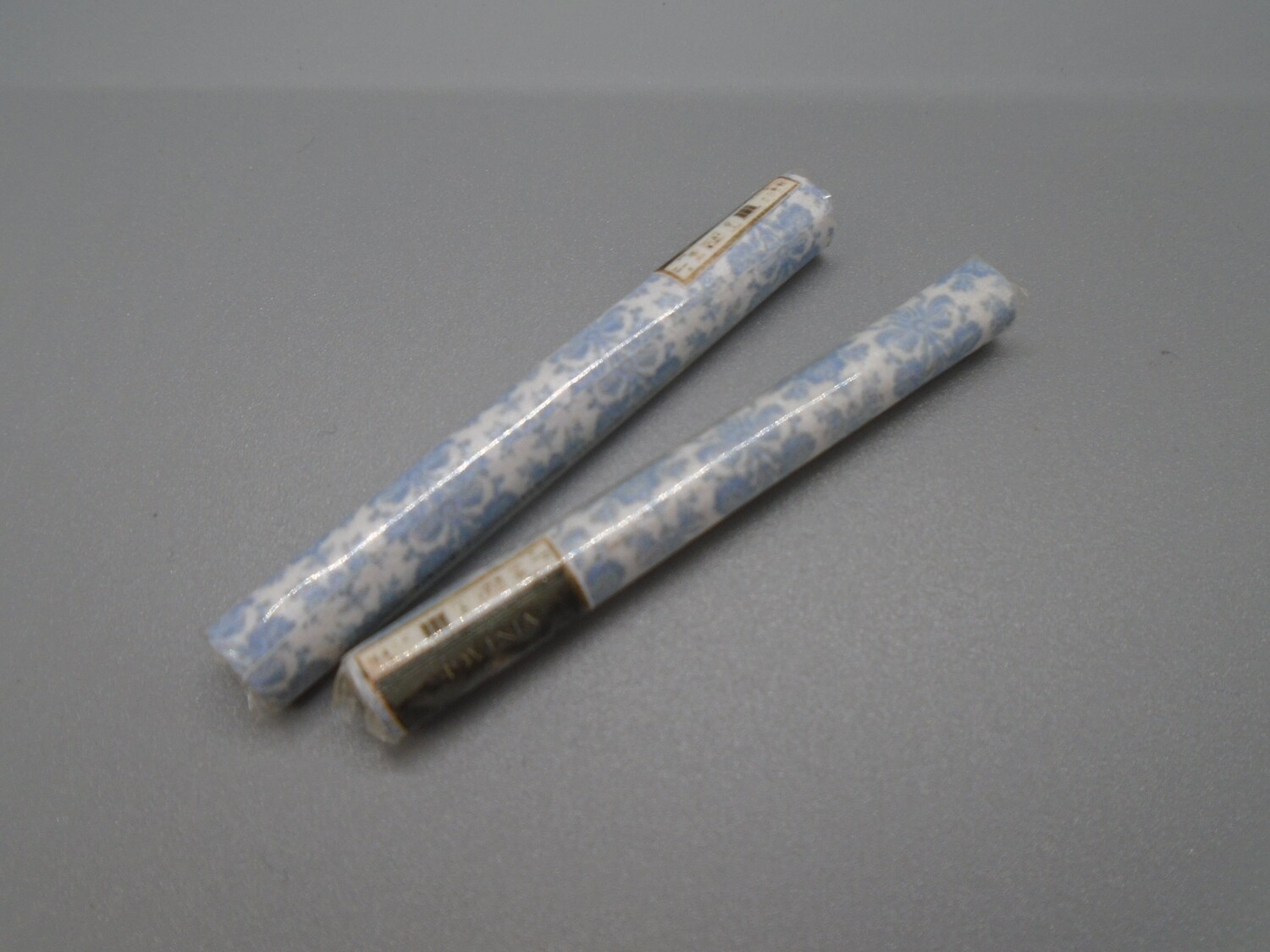 2 ROLLS OF BLUE WALLPAPER