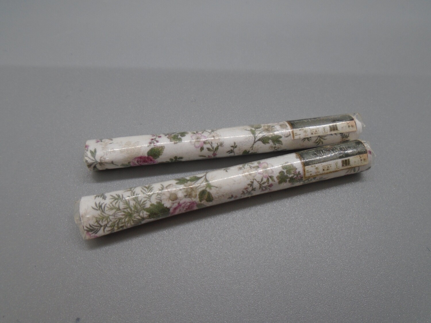 2 ROLLS OF FLORAL WALLPAPER