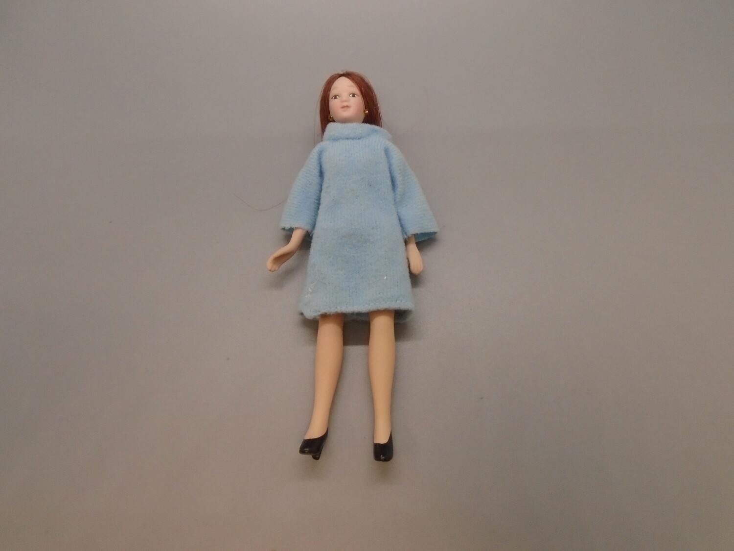 MODERN LADY IN BLUE DRESS WITH LONG HAIR