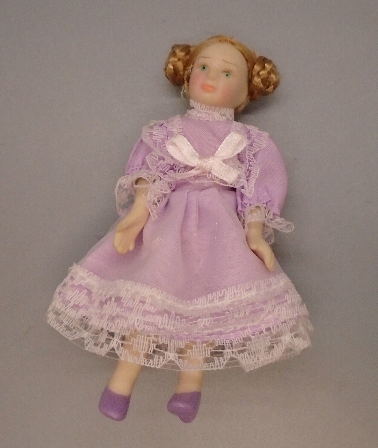GIRL IN LILAC WITH PLAIT BUNS