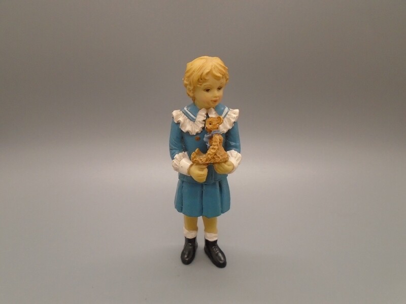 GIRL HOLDING TEDDY