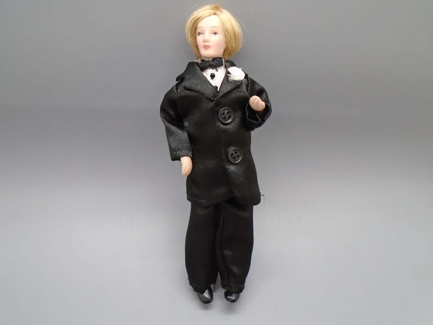 MAN IN BLACK SILK SUIT