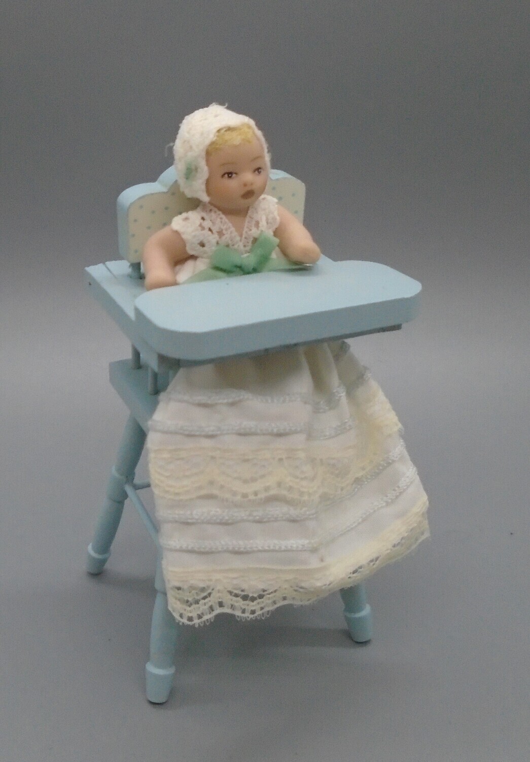 BABY IN HIGHCHAIR