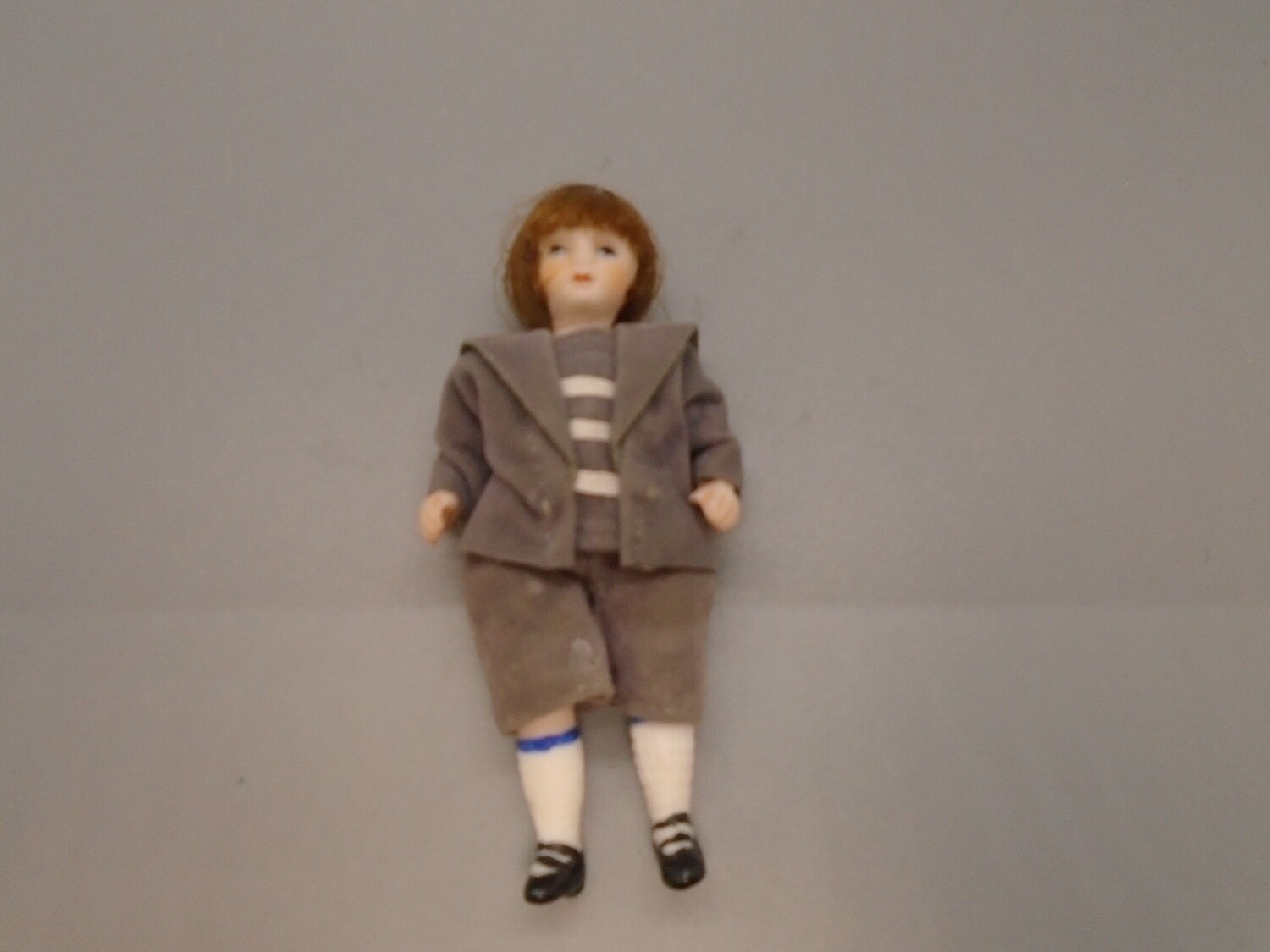 BOY IN GREY SAILOR SUIT