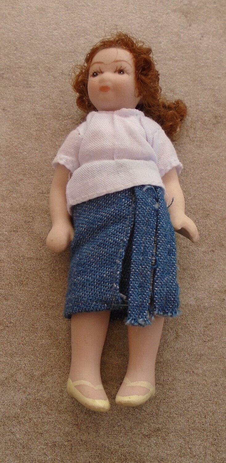GIRL IN DENIM SKIRT